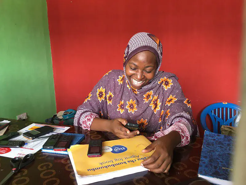 How do taxes affect the price of digital financial services?