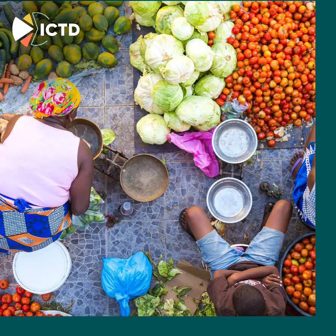 Slide 6 of 8: market traders, seen from above, selling fruit and vegetables