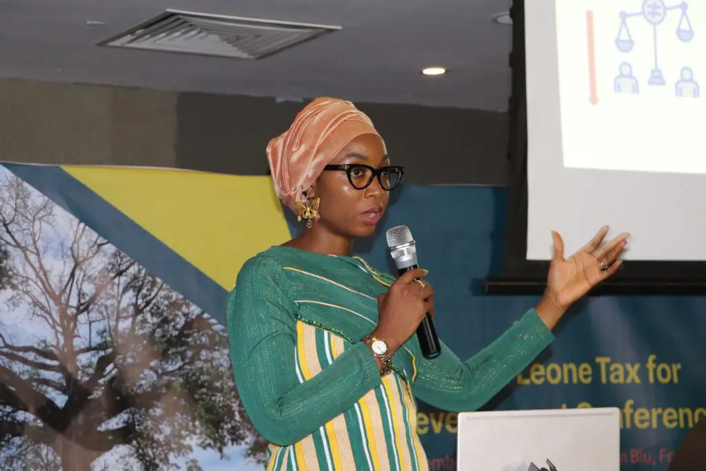 Dr. Yakama Manty Jones of the Ministry of Finance speaking at the conference
