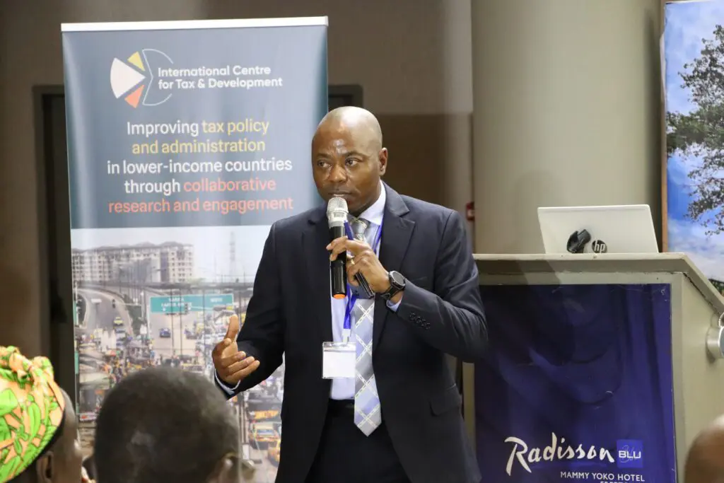 Commissioner General Samuel Jibao speaking at the conference