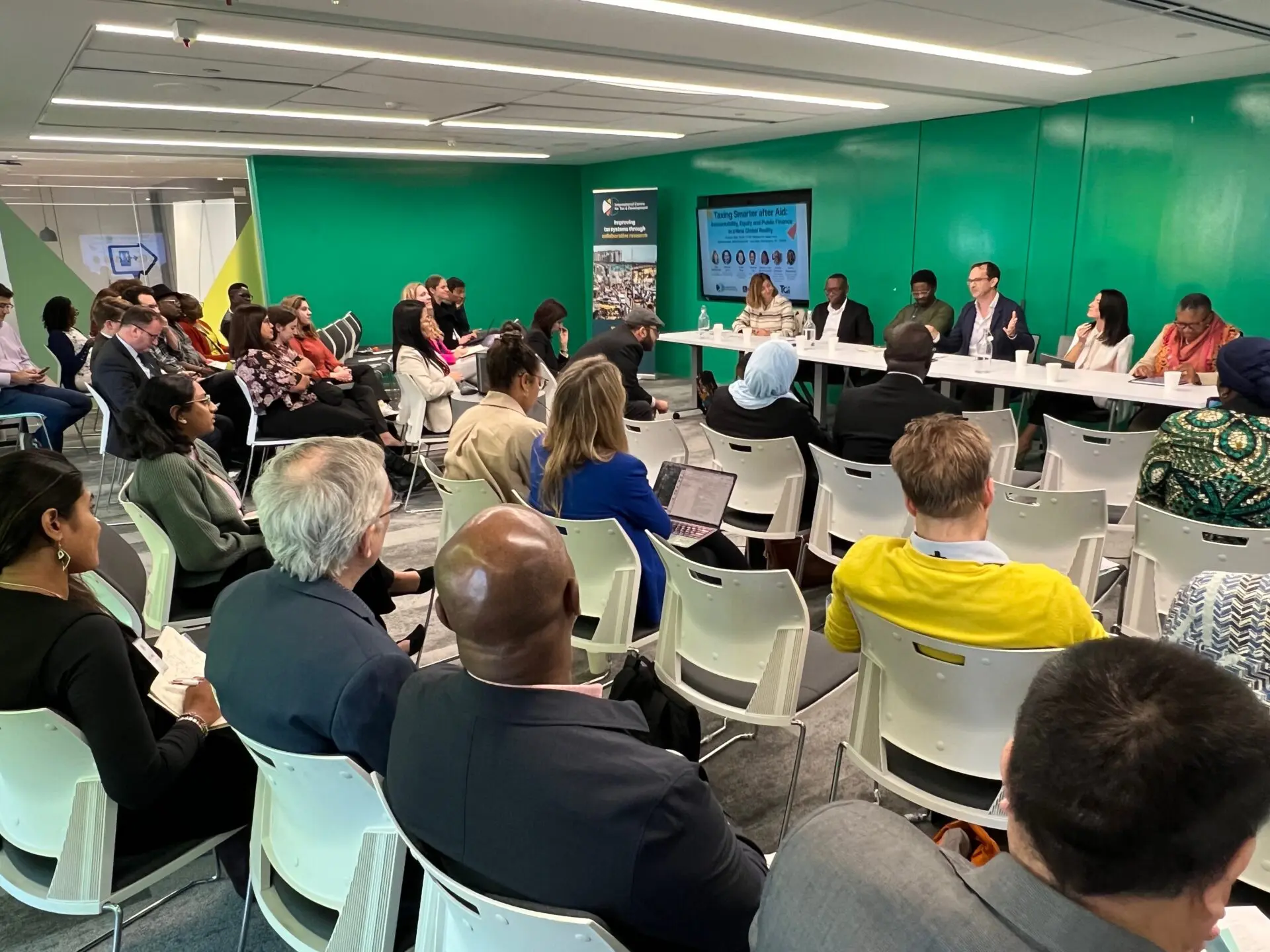 Audience listening to a panel at the Taxing Smarter after Aid event