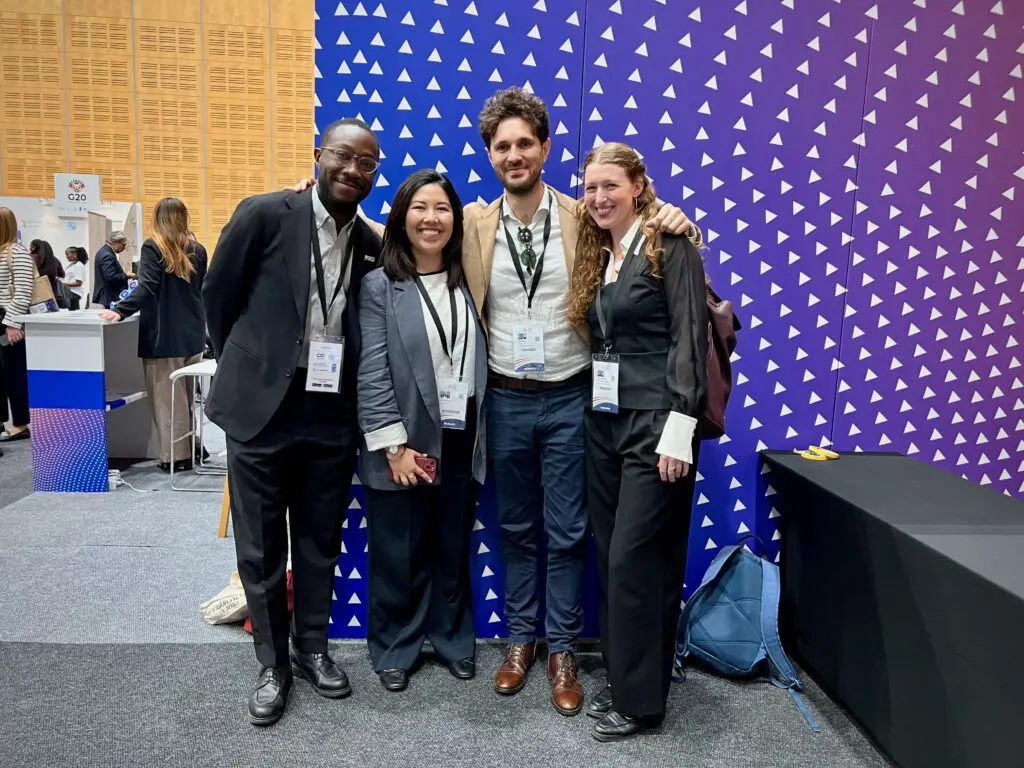 Moyo, Lucia, Fabrizio and Rhiannon in the summit's exhibition hall