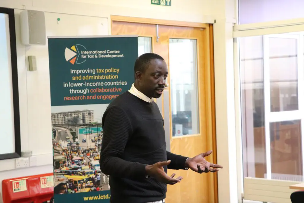 Denis Mukama of the Rwanda Revenue Authority presenting
