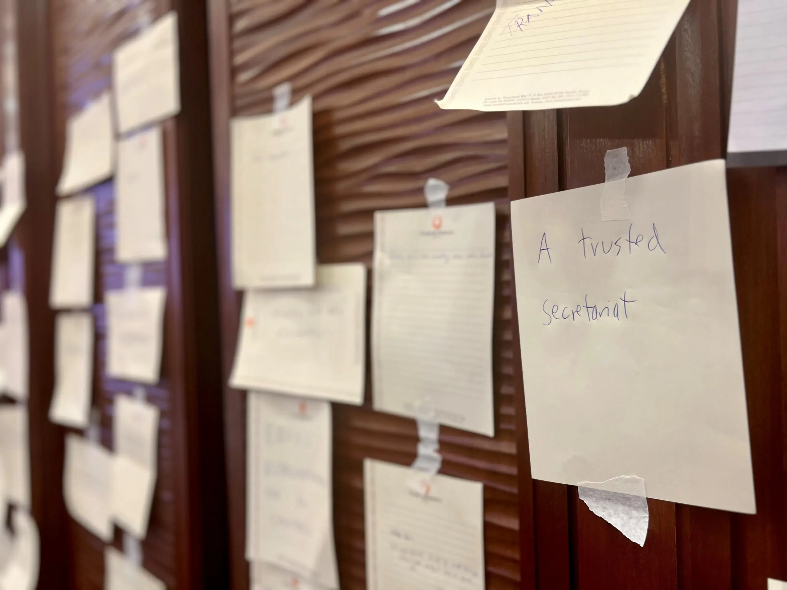 wall of notes posted by participants with the key things they see as important for a global tax institution