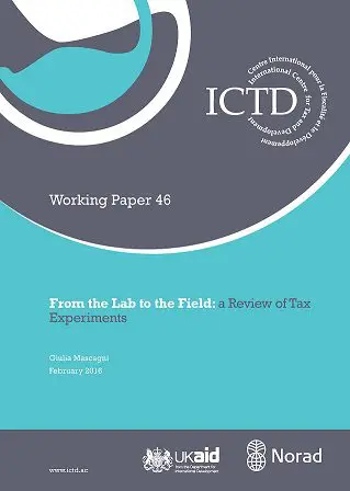 From the Lab to the Field: a Review of Tax Experiments