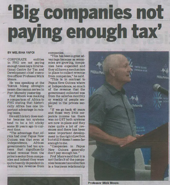 Newspaper clipping: Big companies not paying enough tax, with a photo of Professor Mick Moore